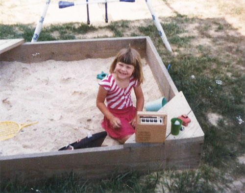 In the sandbox with my Fisher Price Tape Recorder