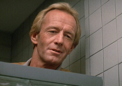 Glass block shower scene in Crocodile Dundee II (1988)