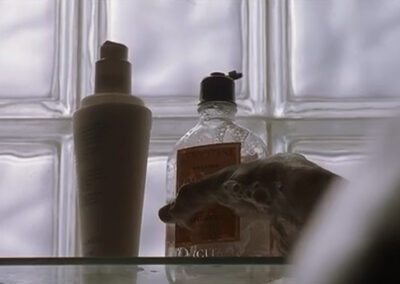 Patrick Bateman's glass block shower in American Psycho (2000)