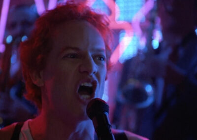 Glass block stage for the Oingo Boingo performance in Back to School (1986)