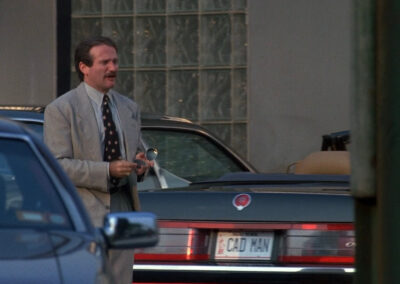 Car dealership from Cadillac Man (1990) is DRIPPING in glass block