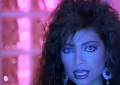 Glass block in Cindy Valentine’s music video for “In Your Midnight Hour”, from her 1987 album, Secret Rendez-Vous