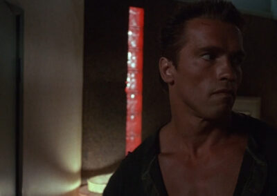 Backlit neon glass black decor in The Sunspot motel in Commando (1985)