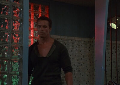 Backlit neon glass black decor in The Sunspot motel in Commando (1985)