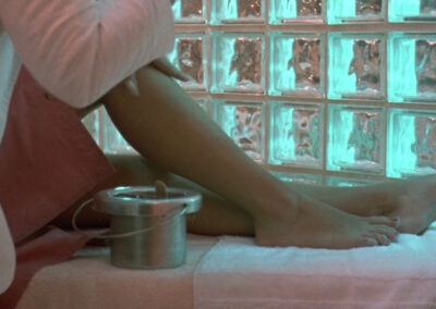 Glass block decorating the salon during the opening credits to Desperately Seeking Susan (1985)