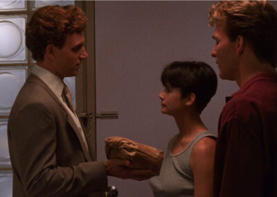 Glass block with a circle motif adorning the entrance to Sam & Molly's apartment in Ghost (1990)