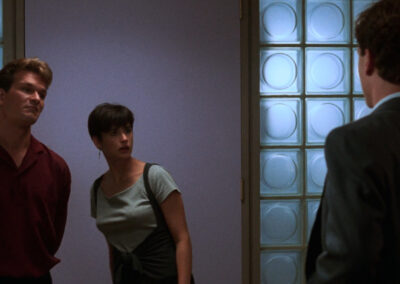 Glass block with a circle motif adorning the entrance to Sam & Molly's apartment in Ghost (1990)