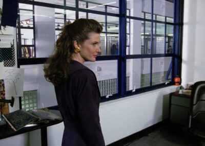 Glass block walls everywhere at the corporate offices of Beverly By Hand, in Stephen King's It (1990