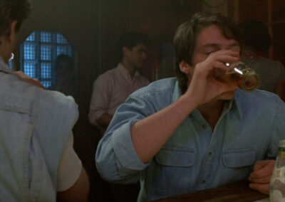 Glass block in the dive bar scene from Street Smart (1987) starring Christopher Reeve as a reporter and Morgan Freeman as a pimp