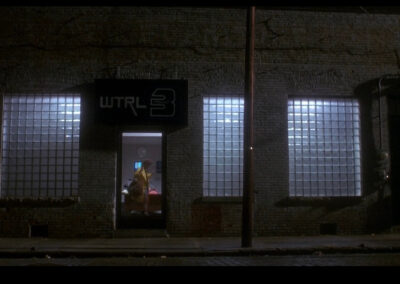 Glass block windows on the front of the WTRL News building in Teenage Mutant Ninja Turtles (1990)