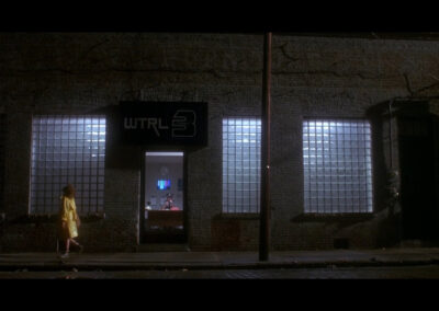 Glass block windows on the front of the WTRL News building in Teenage Mutant Ninja Turtles (1990)