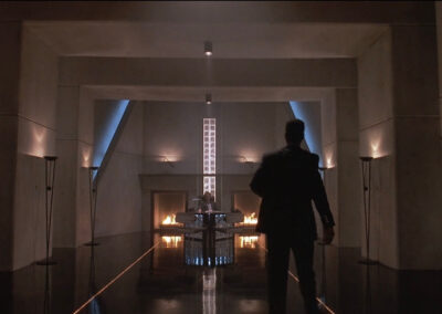 Glass block strip on wall and under desk in The Big Picture (1989)