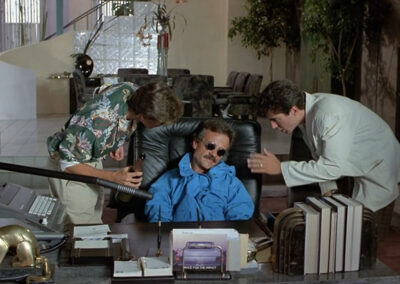 Glass block wall accents in the beach house at Weekend at Bernie's (1989)